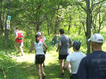 Runners heading out during Woods Walk and Trail Run at Pfeiffer Nature Center