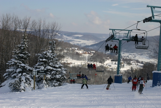 Skiiers on the slopes at Holiday Valley Resort