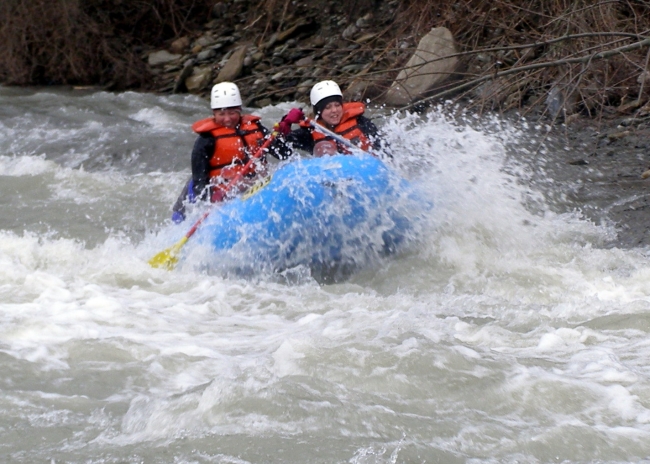 Two women Whitewater rafting on the Cattaraugus Creek. Credit: Rick Miller