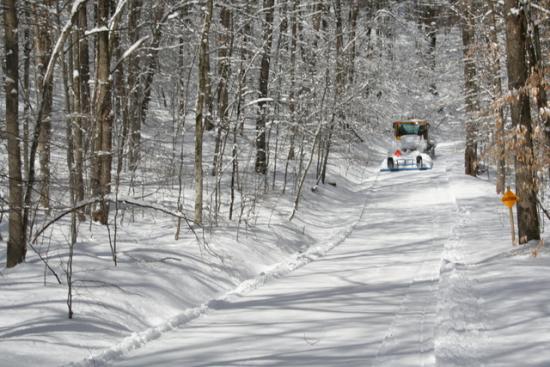 Snowmobile Trail Groomer on a trail at Allegany State Park