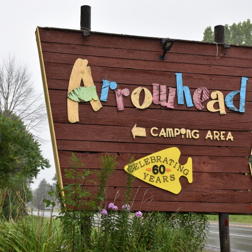 Photo of Arrowhead Campground sign