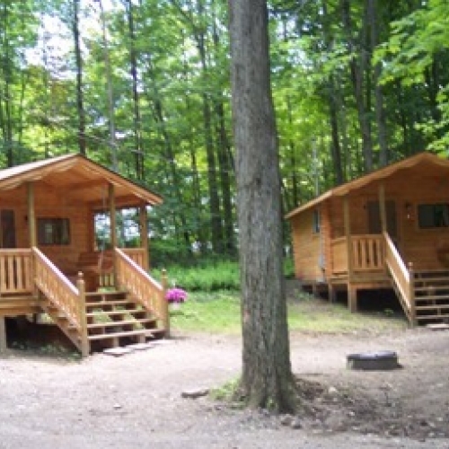 Two of the cabins at Pope Haven