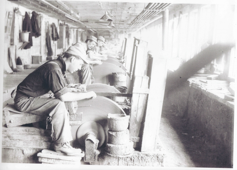 Photo of men working on cutlery from American Cutlery Museum