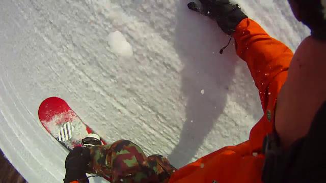 Carving on a snowboard as seen from the top down at Holiday Valley in New York